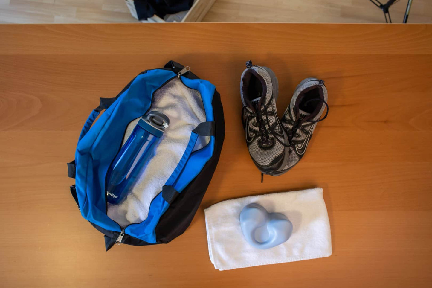 TheSport Craniocradle with duffel bag, shoes, and water bottle